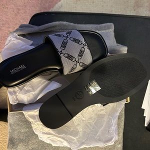 Michael Kors black flats purchased from Saks Fifth Ave, authentic.